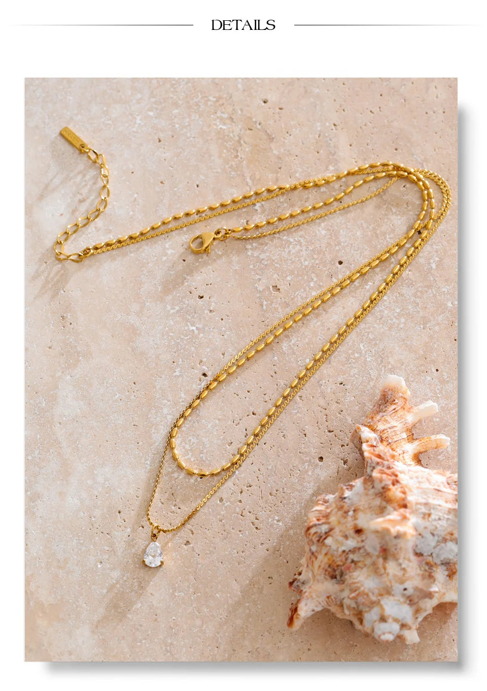 Cubic zirconia geometric layered necklace in gold-plated stainless steel with cubic zirconia.