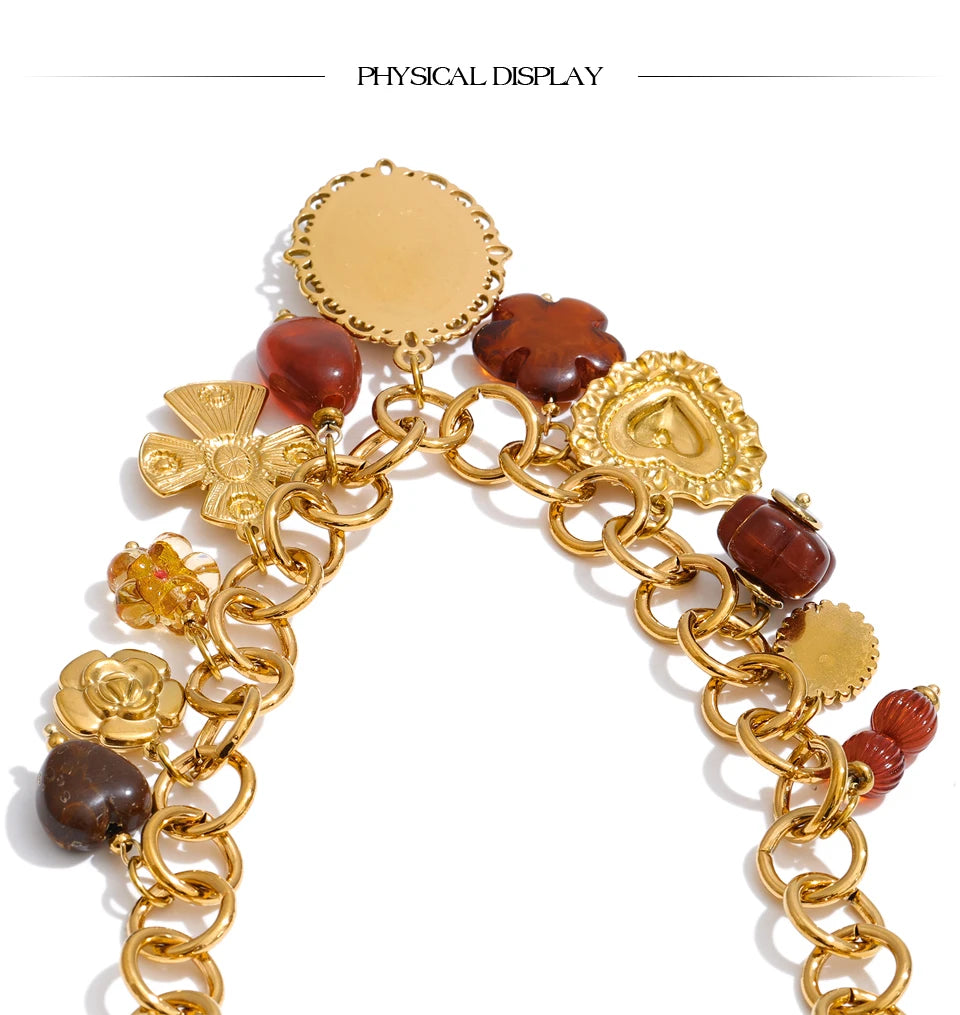 Resin acrylic heart necklace in gold-plated stainless steel with resin and acrylic.