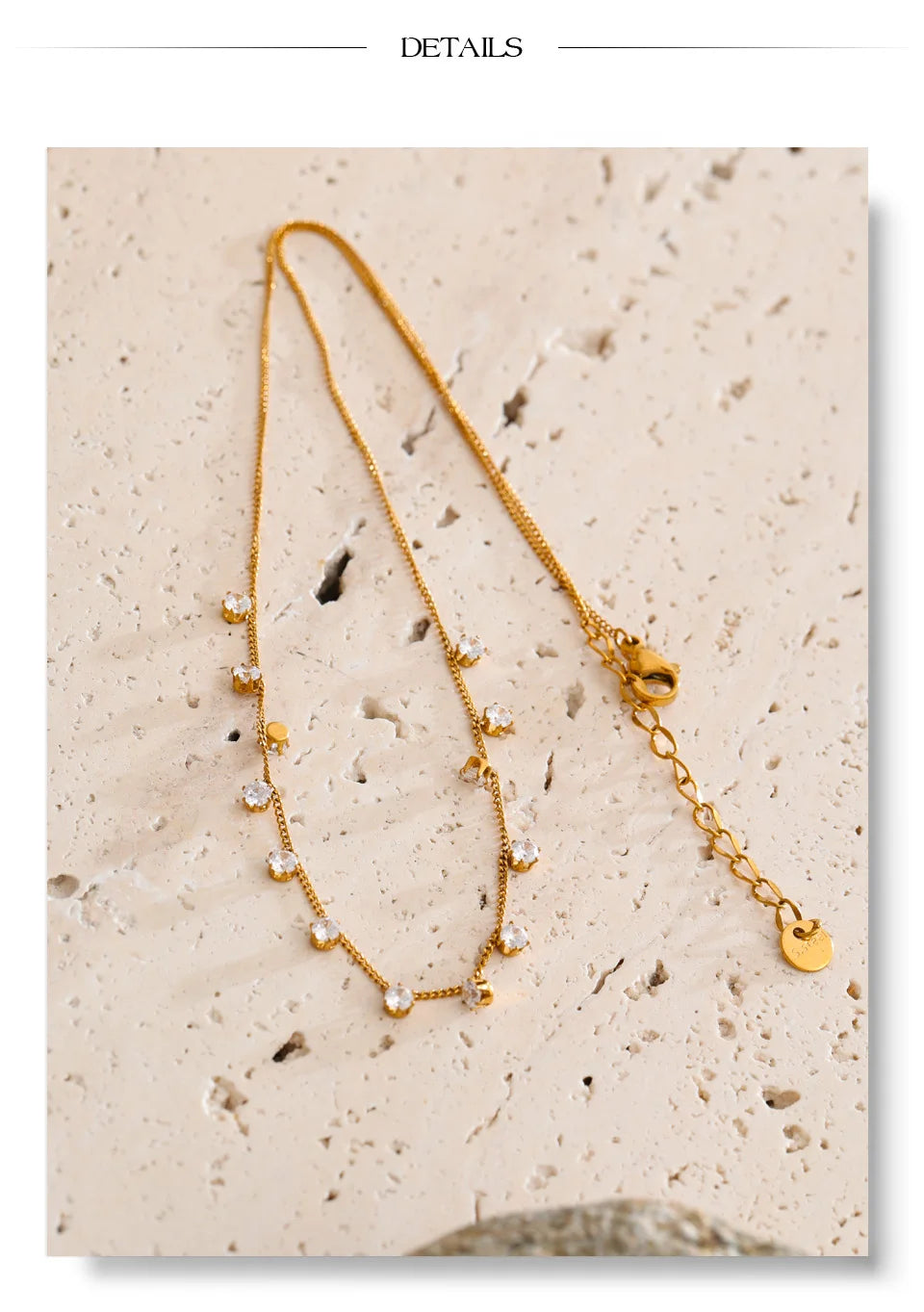 Cubic zirconia geometric necklace in gold-plated stainless steel with cubic zirconia.