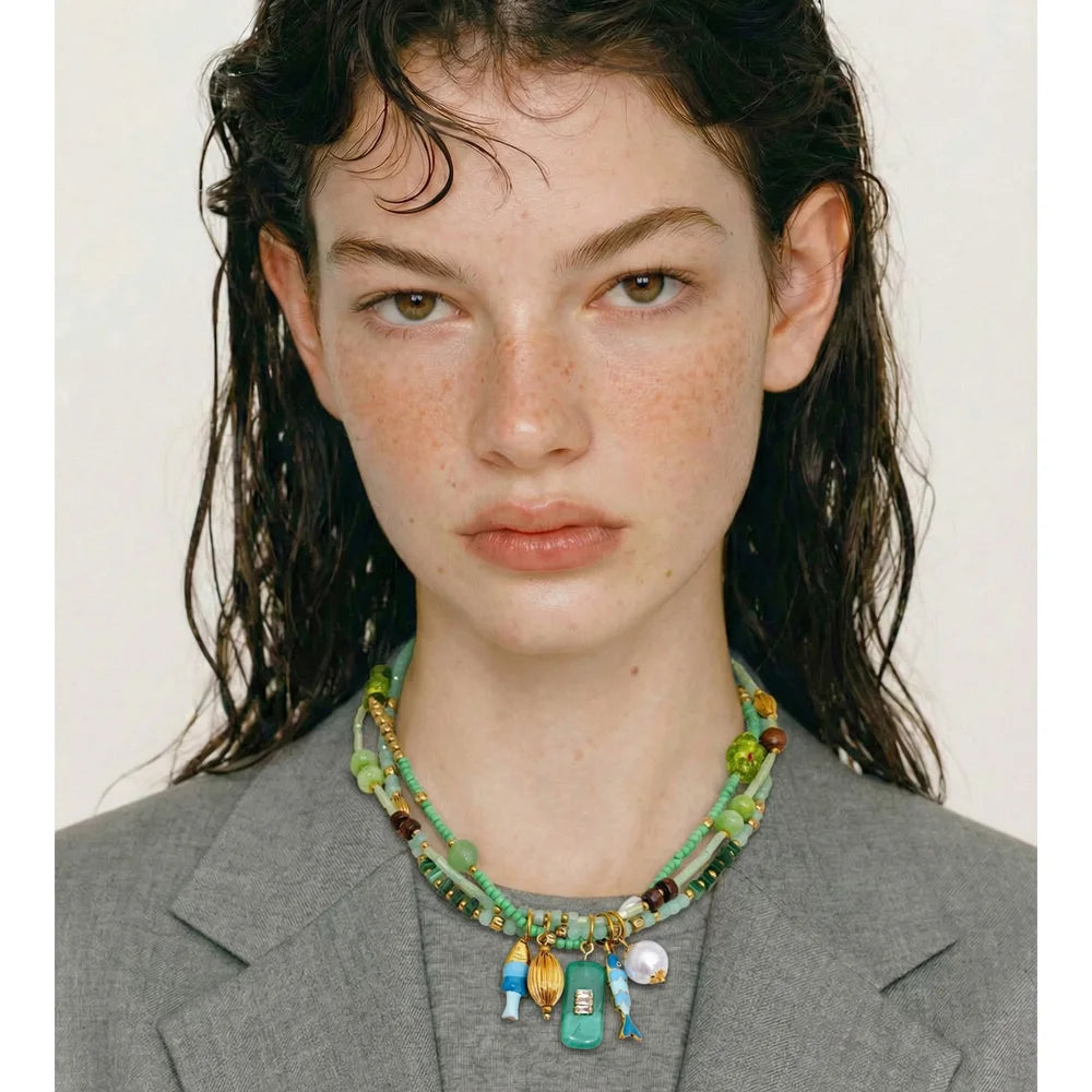 Pearl crystal geometric necklace in gold-plated stainless steel with pearl and crystal.