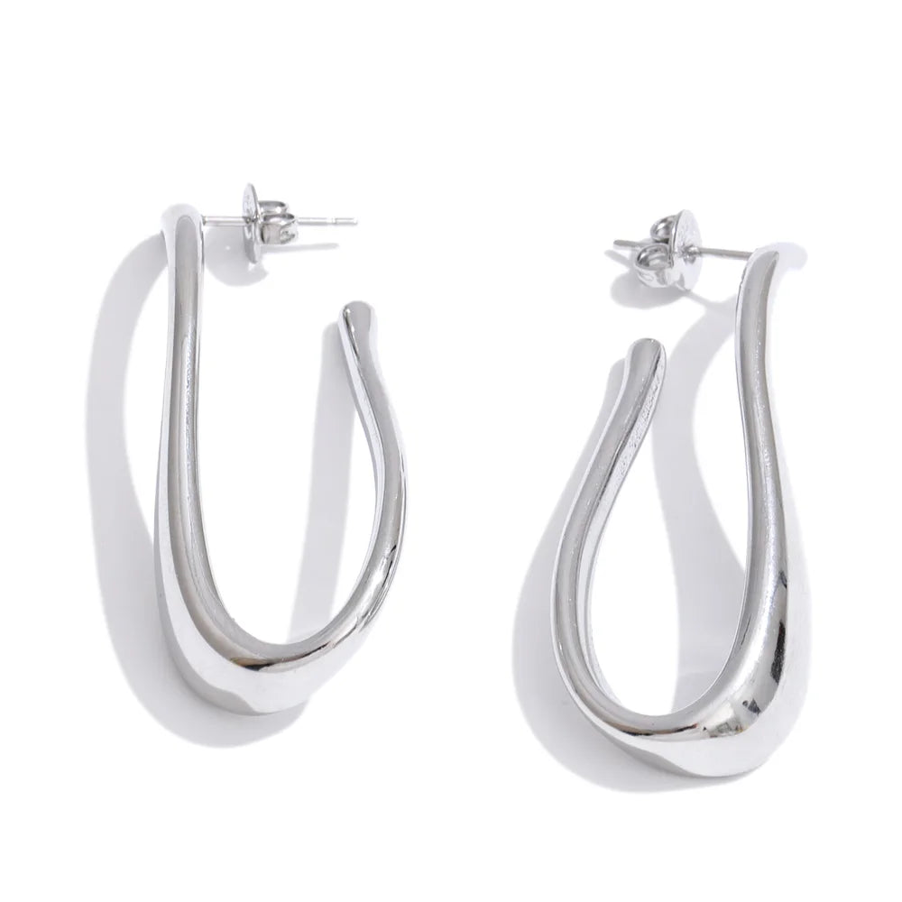 Geometric earrings in gold-plated 316L stainless steel.