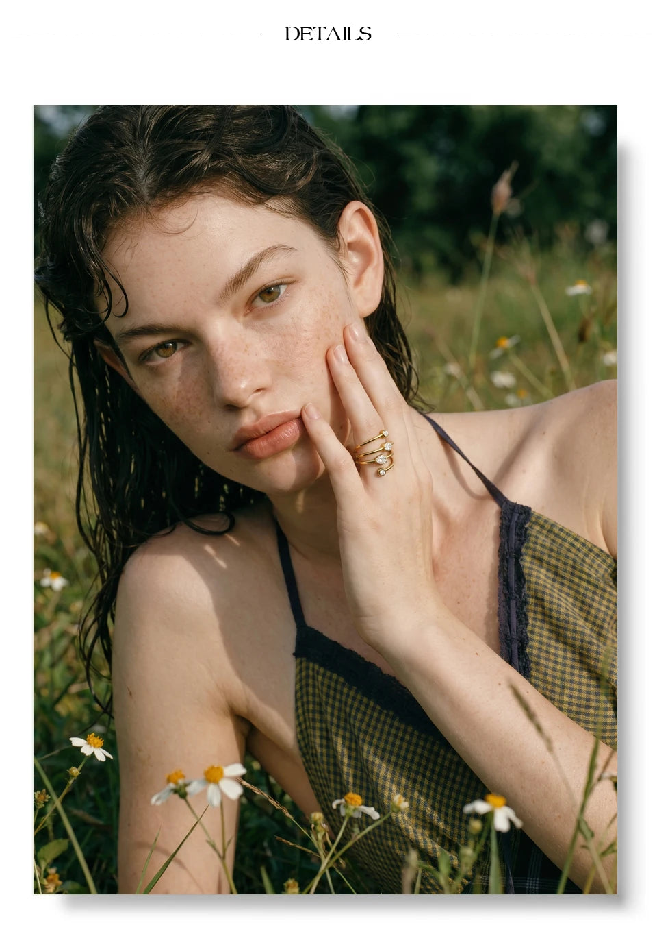 Cubic zirconia geometric layered ring in 18K gold-plated stainless steel with cubic zirconia.