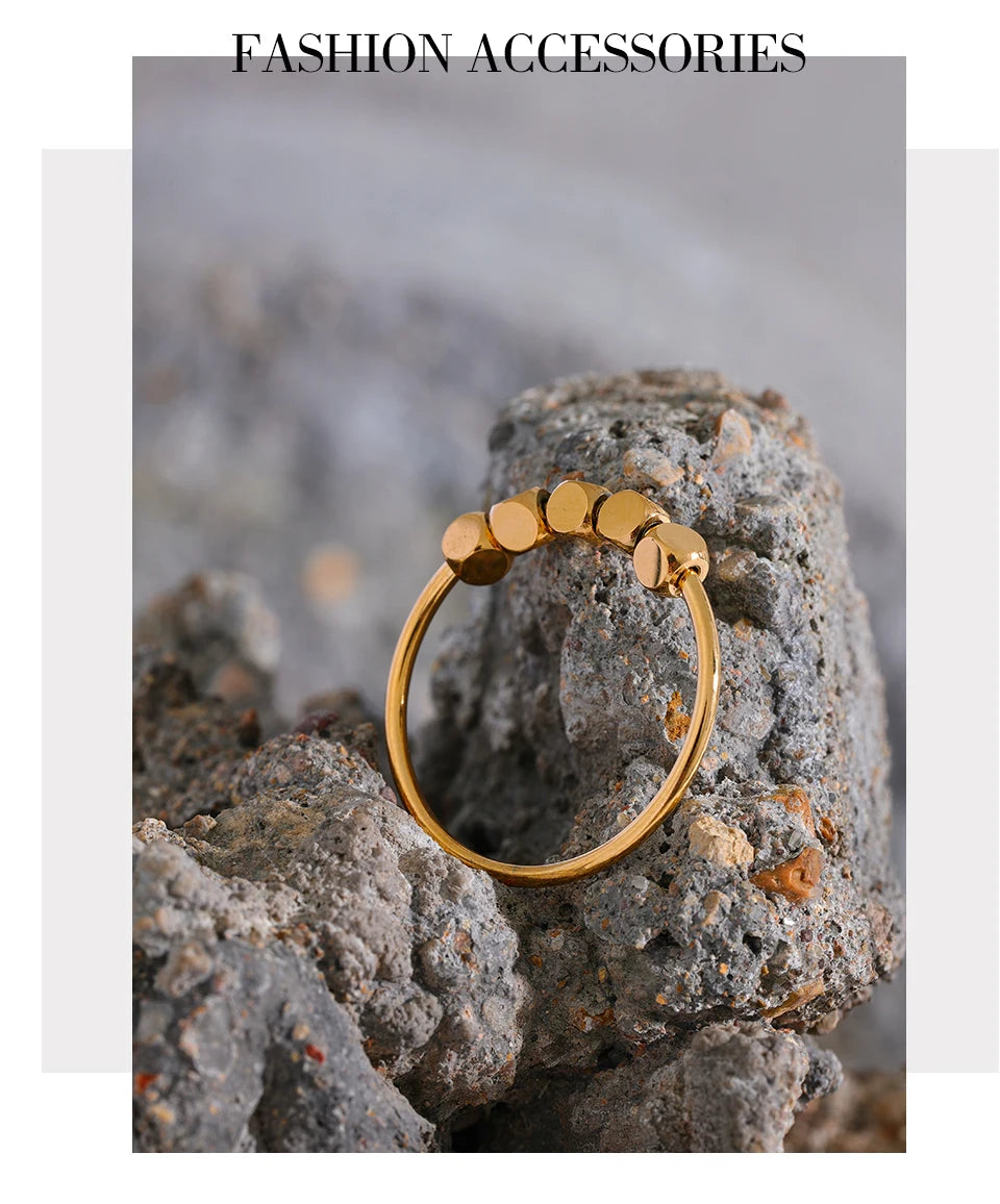 Beaded geometric ring in 18K gold-plated stainless steel.