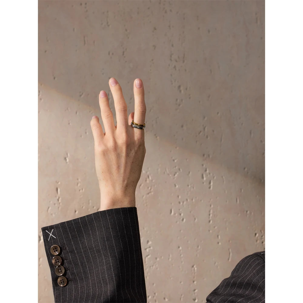 Geometric ring in 18K gold-plated stainless steel.