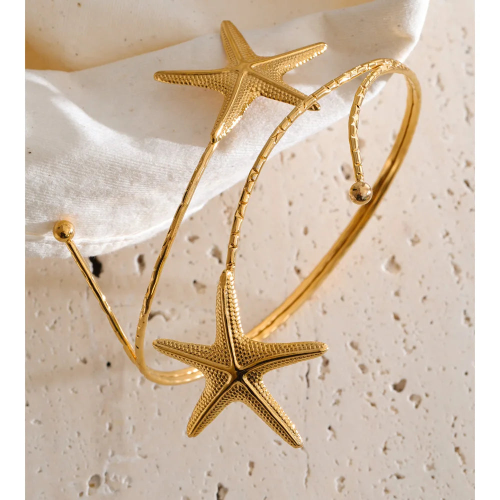 Star bracelet in gold-plated stainless steel.
