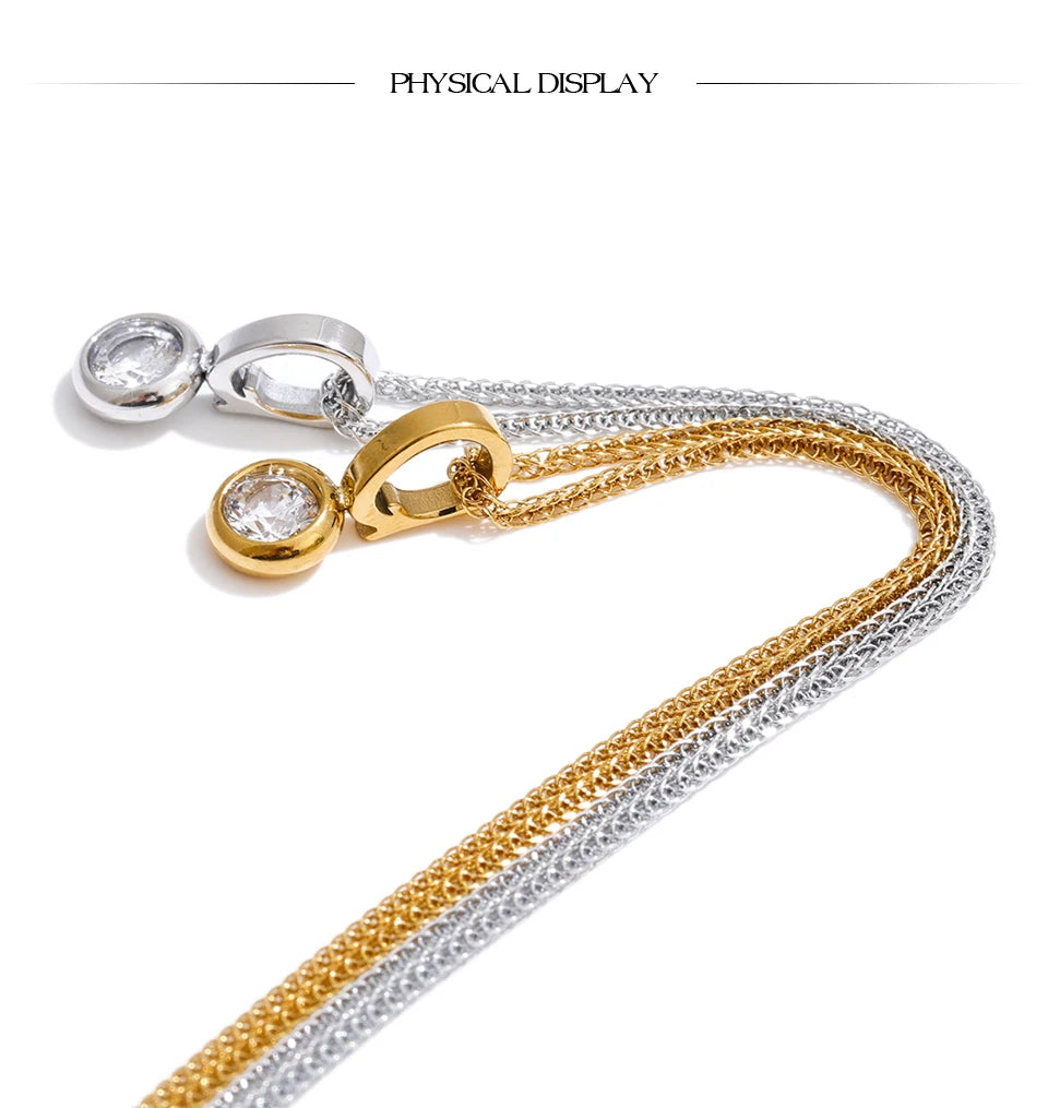 Cubic zirconia geometric necklace in gold-plated stainless steel with cubic zirconia.