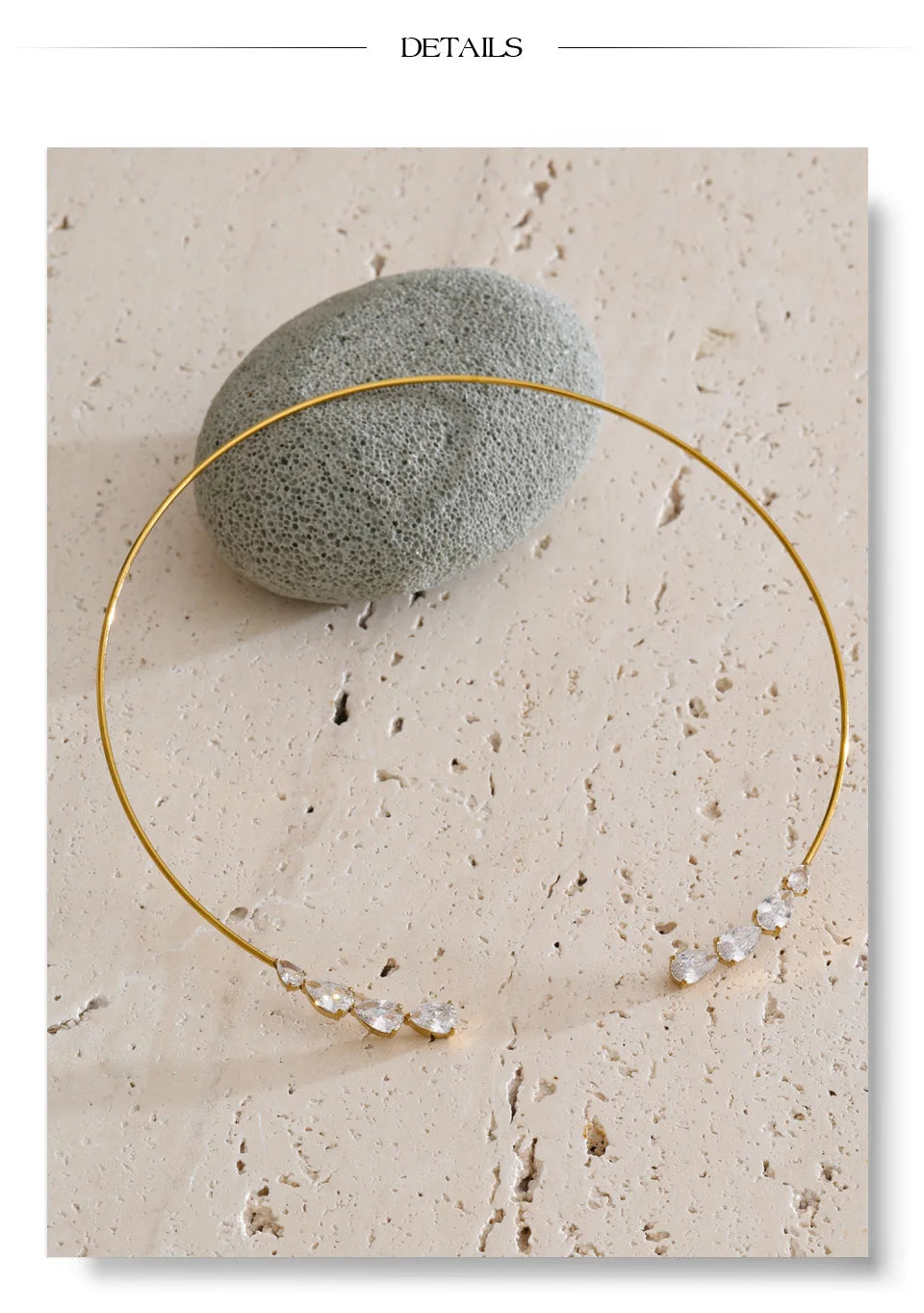 Cubic zirconia geometric necklace in gold-plated stainless steel with cubic zirconia.