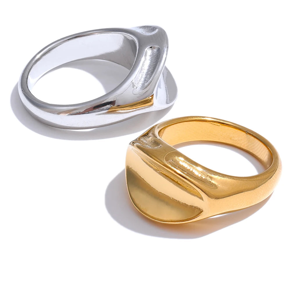 Gold-plated stainless steel ring with a unique design.