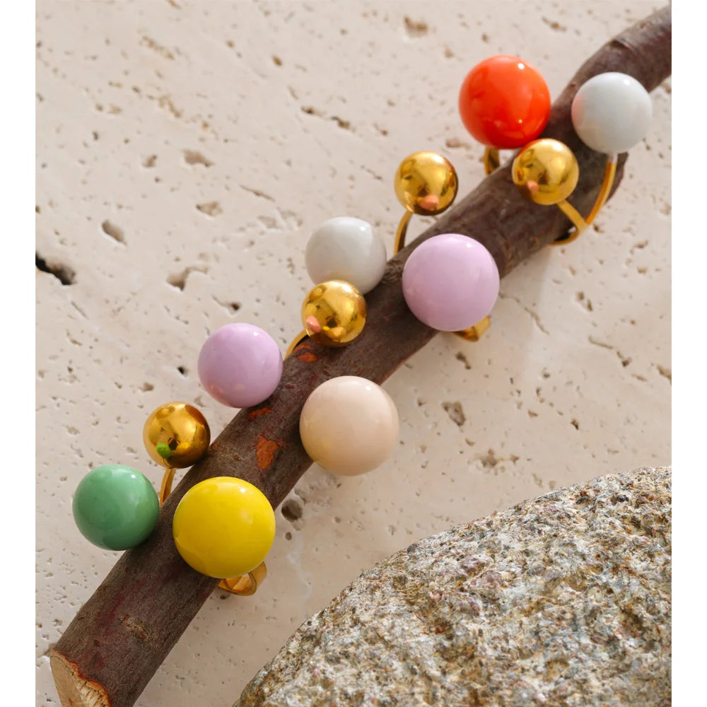 Enamel multi-color geometric ring in 18K gold-plated stainless steel with enamel.