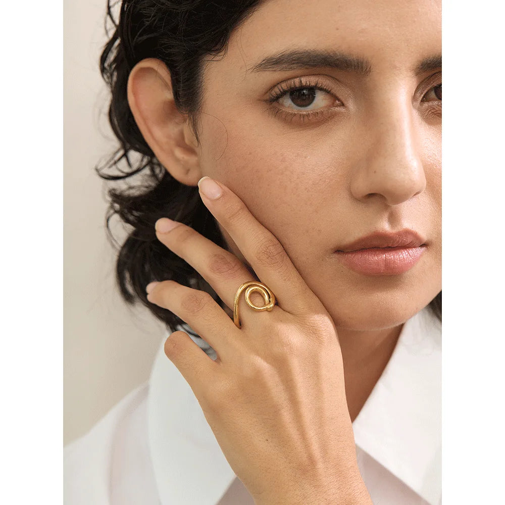 Geometric ring in 18K gold-plated 316L stainless steel.