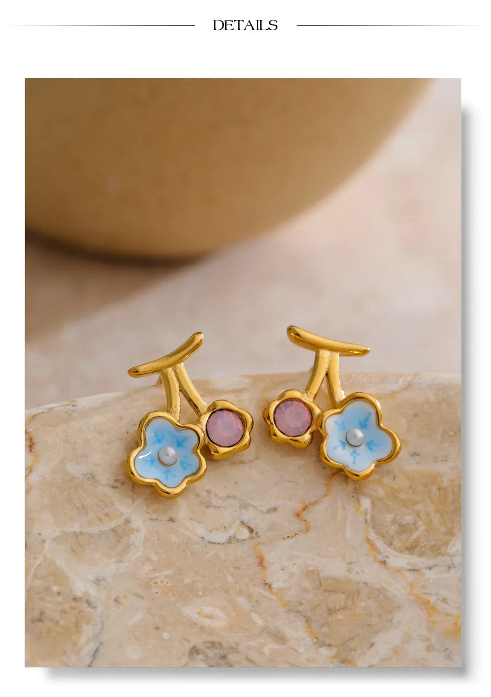 Pearl enamel flower earrings in gold-plated stainless steel with pearl and enamel.