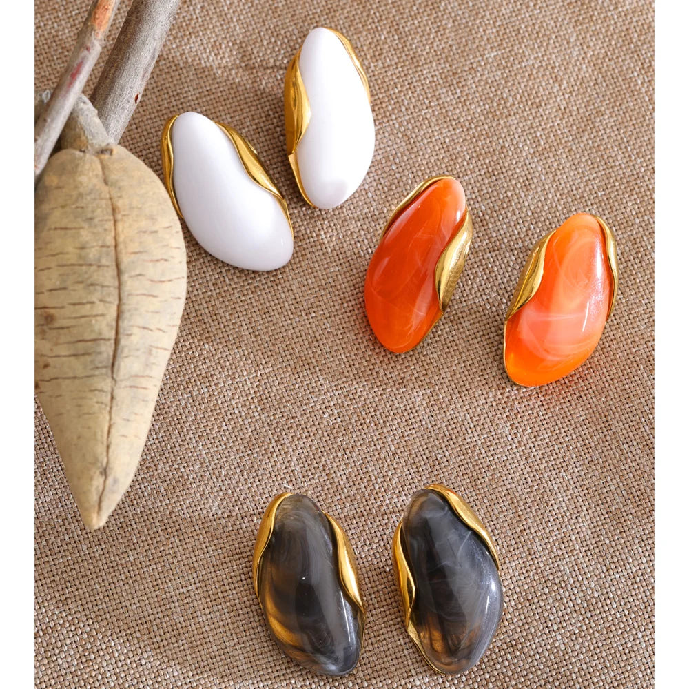 Resin acrylic multi-color earrings in gold-plated stainless steel with resin and acrylic.
