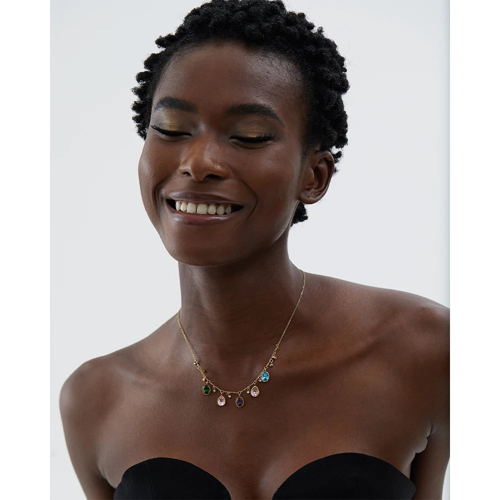 Cubic zirconia multi-color geometric necklace in gold-plated stainless steel with cubic zirconia.