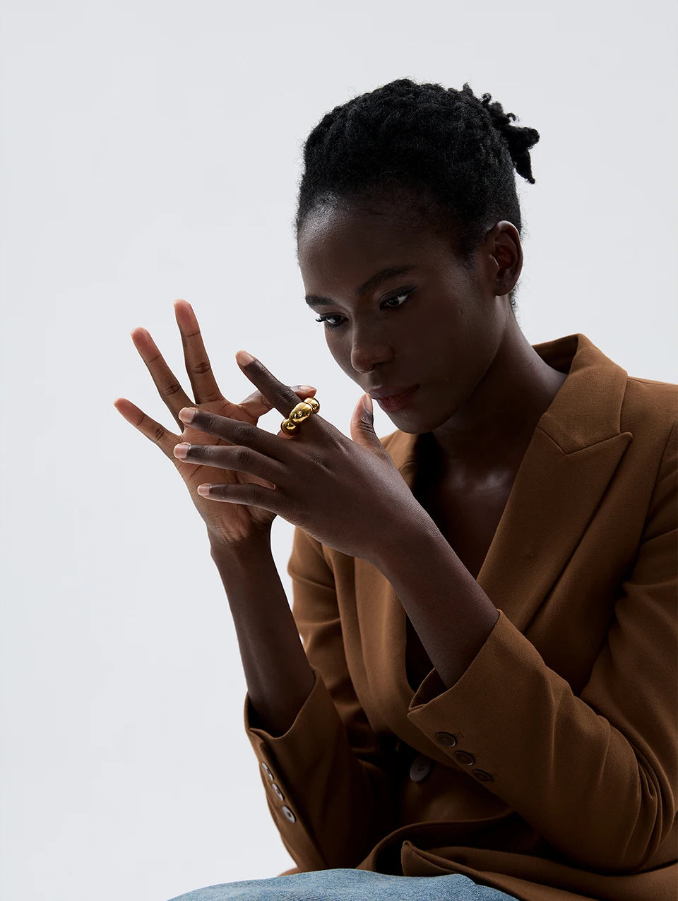 Flower geometric ring in 18K gold-plated 316L stainless steel.