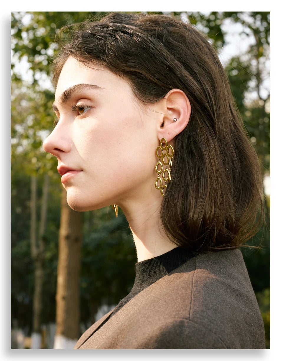 Geometric earrings in gold-plated stainless steel.
