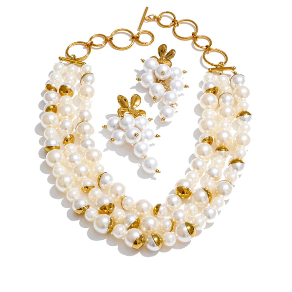 Gold-plated stainless steel earrings with pearl.