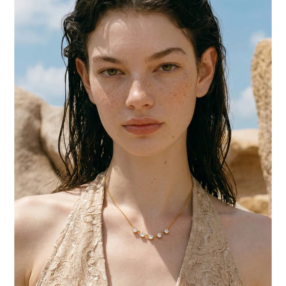 Cubic zirconia geometric necklace in gold-plated stainless steel with cubic zirconia.