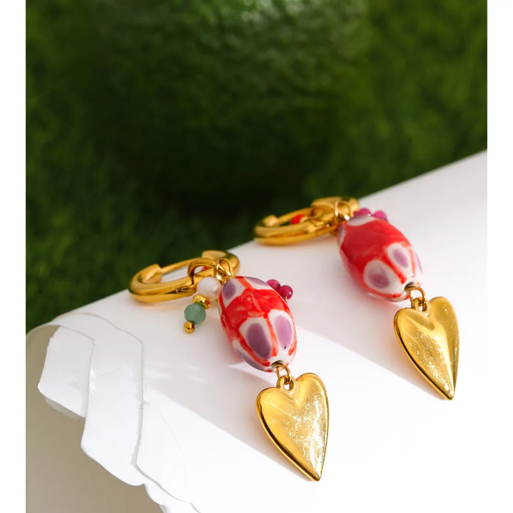 Red heart earrings in gold-plated stainless steel.