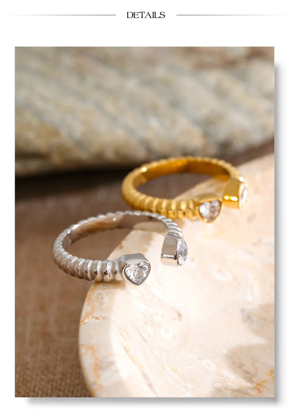Cubic zirconia heart ring in gold-plated stainless steel with cubic zirconia.