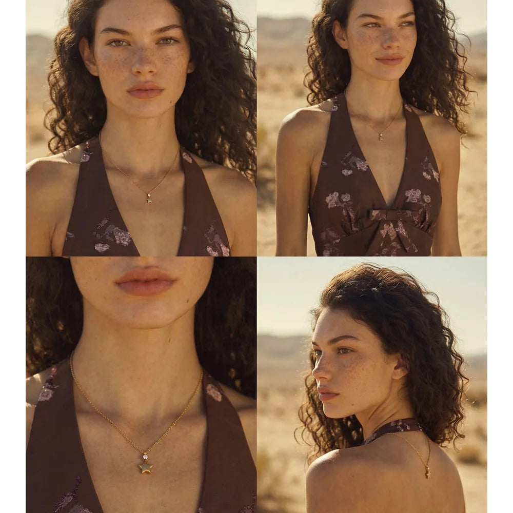 Cubic zirconia star necklace in gold-plated stainless steel with cubic zirconia.