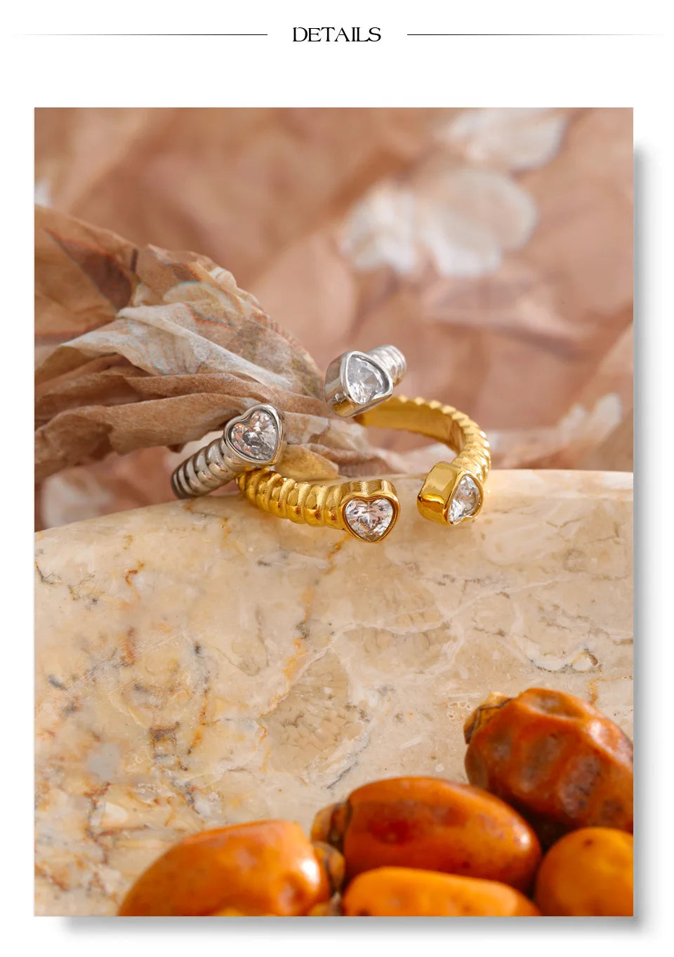 Cubic zirconia heart ring in gold-plated stainless steel with cubic zirconia.