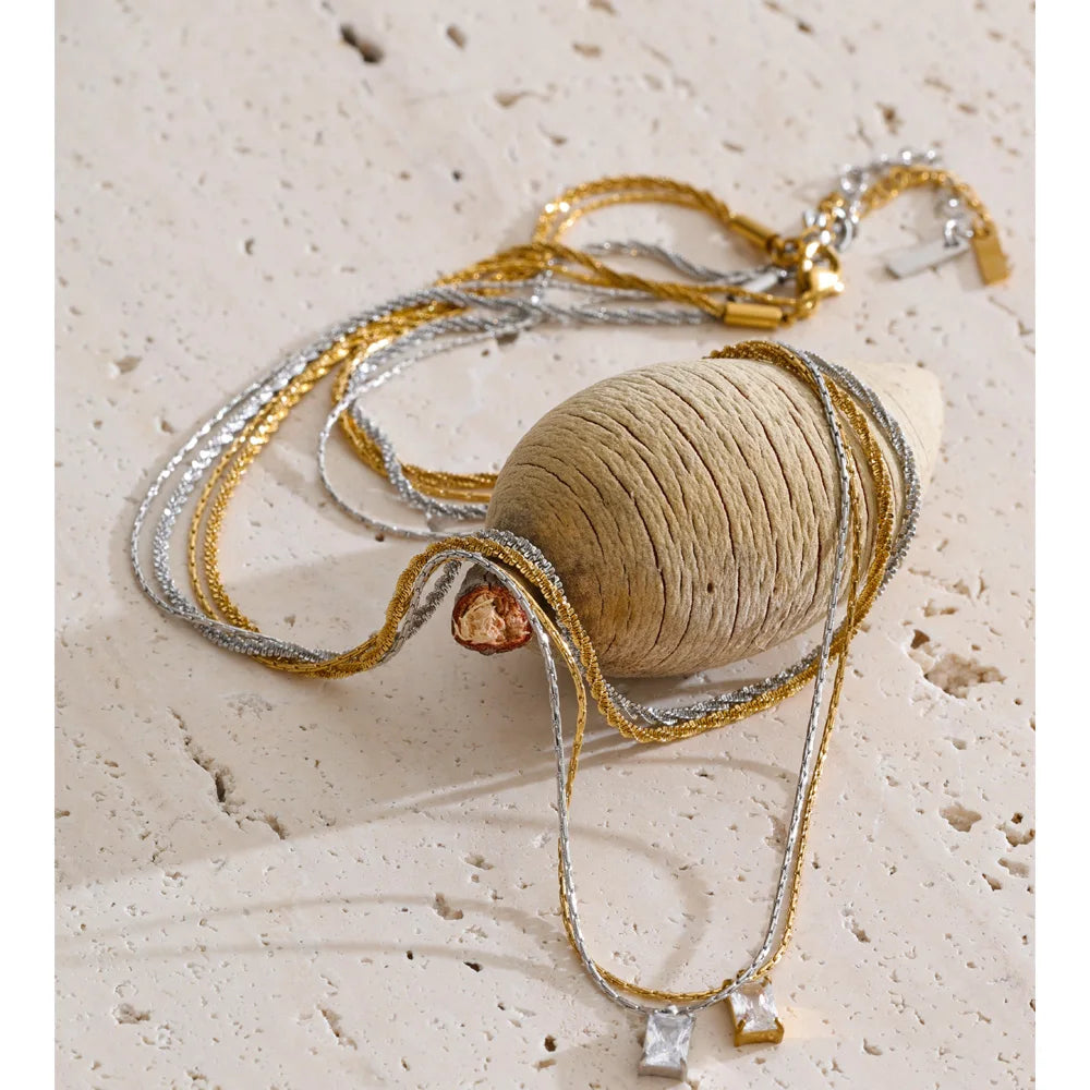 Cubic zirconia geometric chain necklace in gold-plated stainless steel with cubic zirconia.