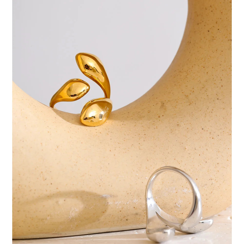 Geometric ring in gold-plated stainless steel.
