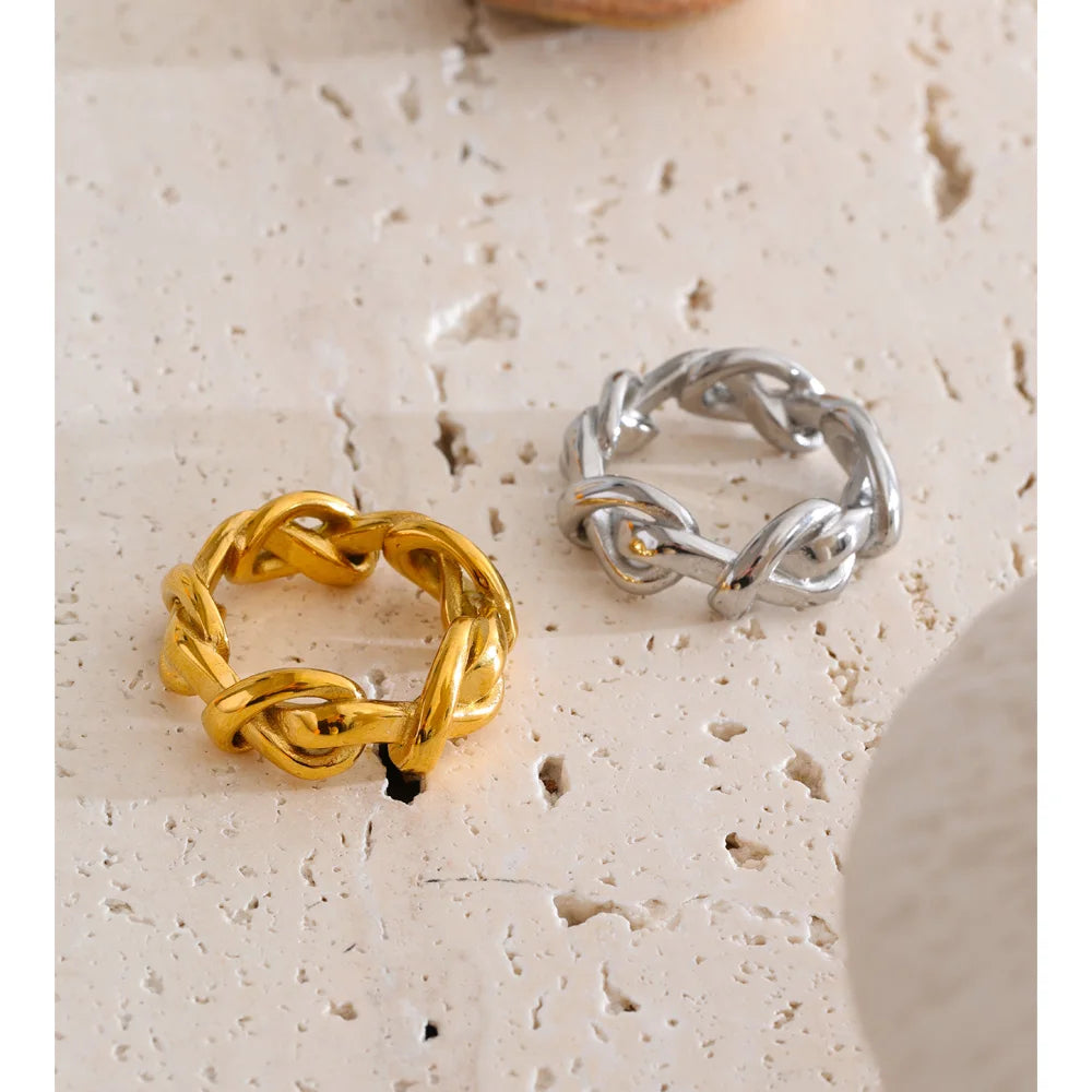 Geometric chain ring in 18K gold-plated stainless steel.