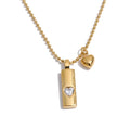 Cubic zirconia heart geometric necklace in gold-plated stainless steel with cubic zirconia.