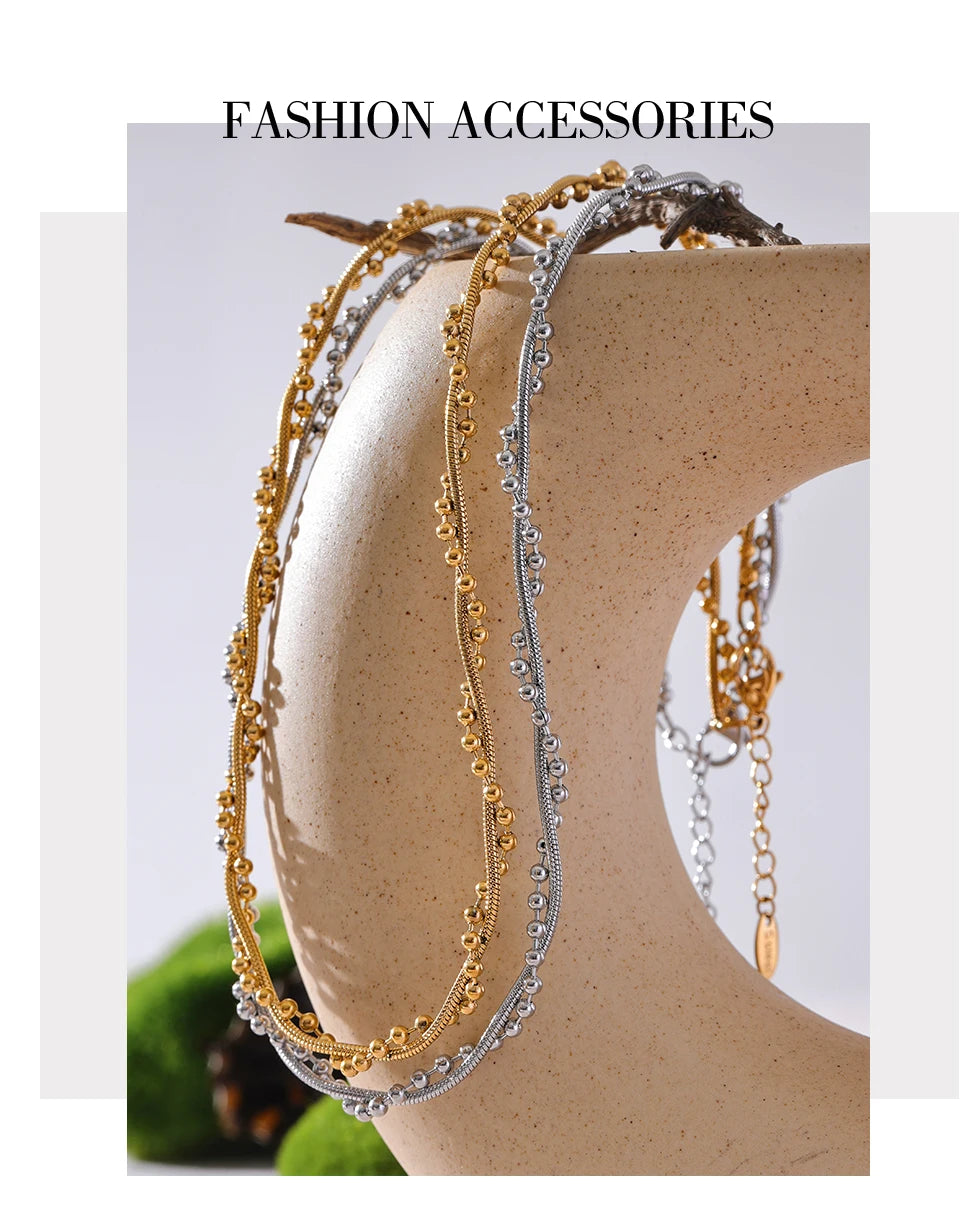 Geometric chain necklace in gold-plated stainless steel.