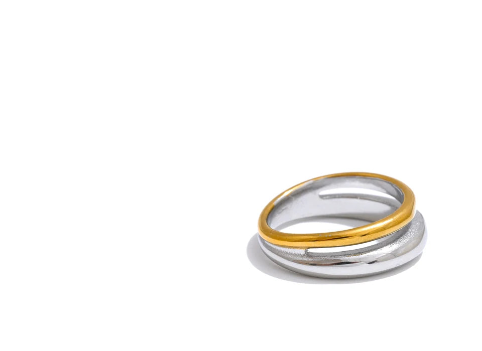 Geometric ring in 18K gold-plated stainless steel.