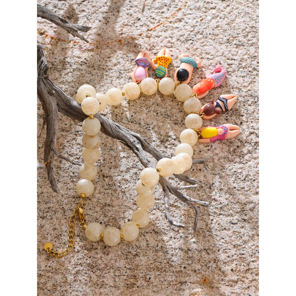Resin glass natural stone necklace in gold-plated stainless steel with natural stone and resin.