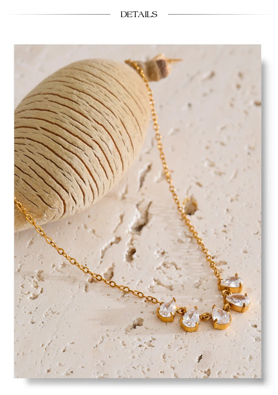 Cubic zirconia geometric necklace in gold-plated stainless steel with cubic zirconia.
