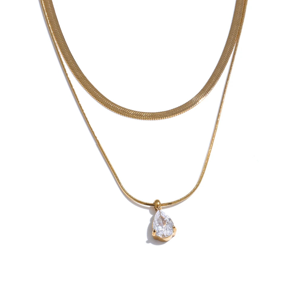 Cubic zirconia snake geometric necklace in gold-plated stainless steel with cubic zirconia.