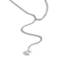 Cubic zirconia pearl geometric necklace in gold-plated stainless steel with pearl and cubic zirconia.