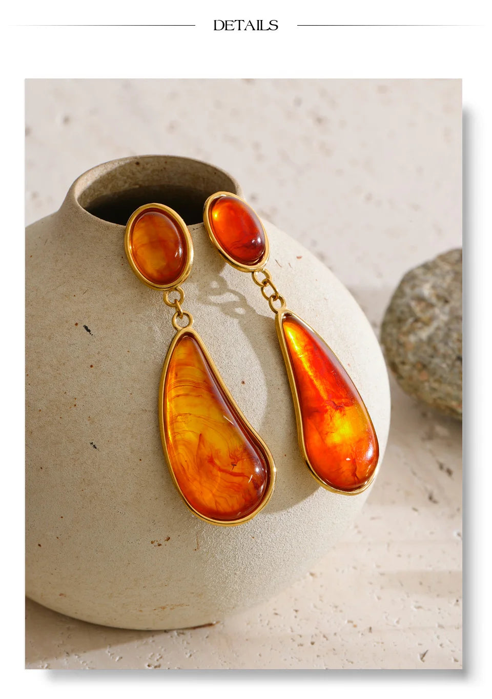 Resin acrylic geometric earrings in gold-plated stainless steel with resin and acrylic.