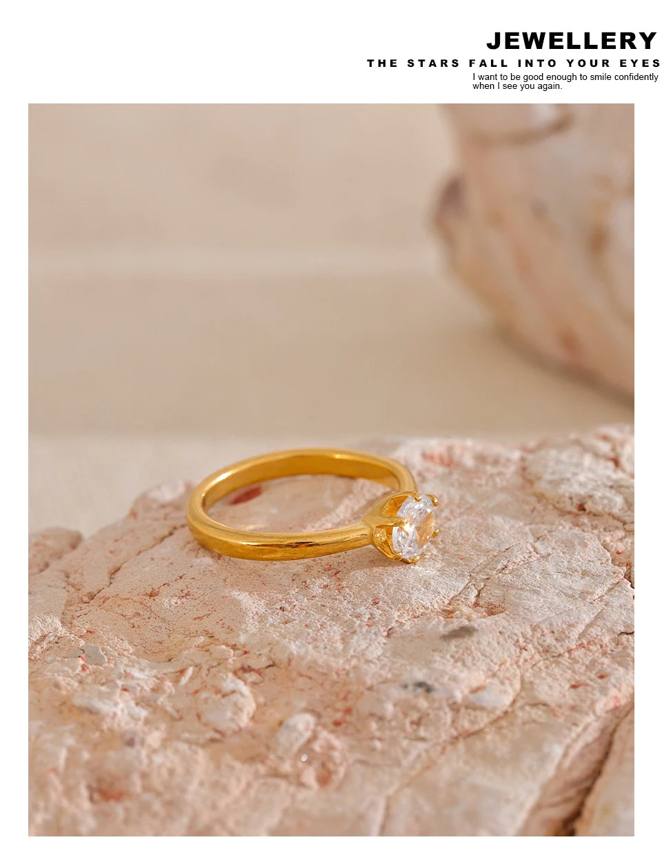 Cubic zirconia geometric ring in 18K gold-plated stainless steel with cubic zirconia.