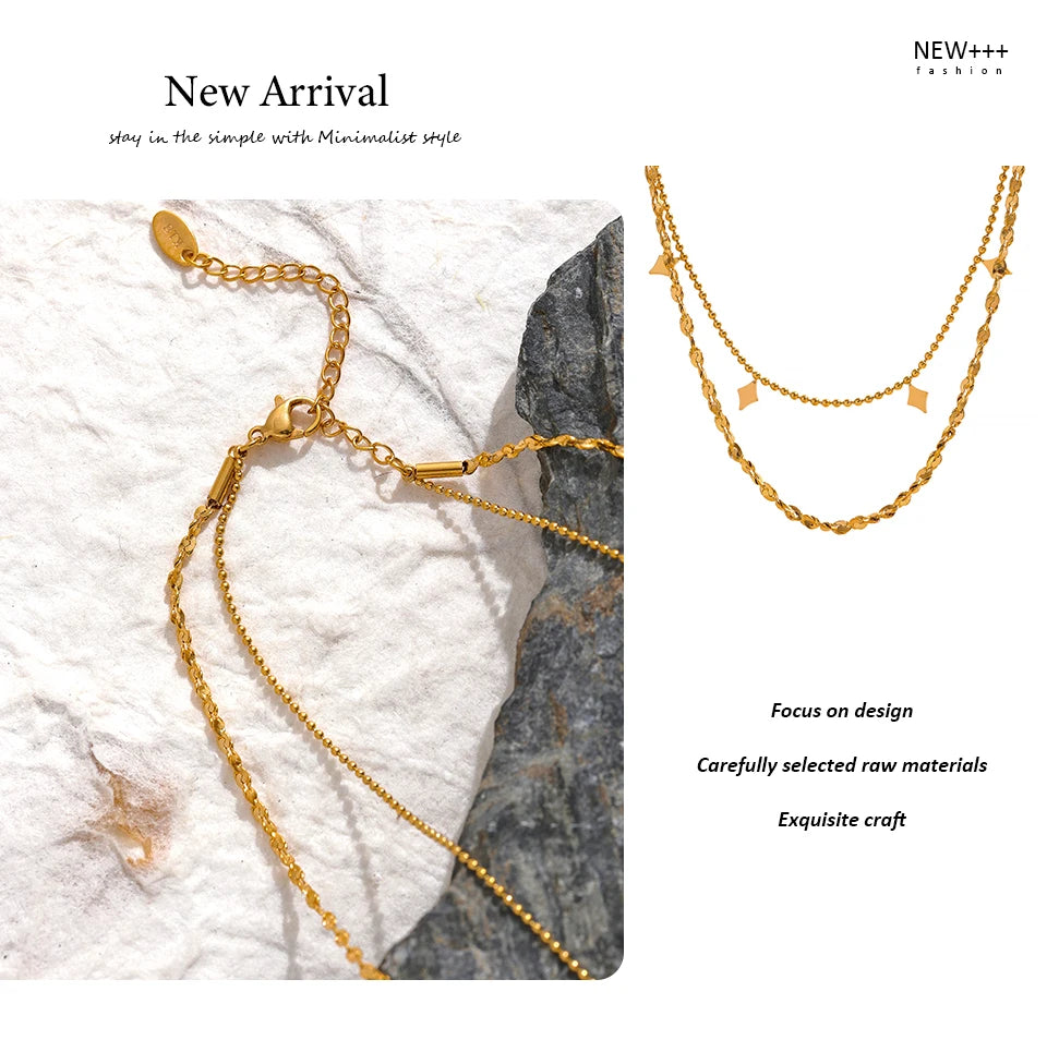 Geometric chain layered necklace in gold-plated stainless steel.