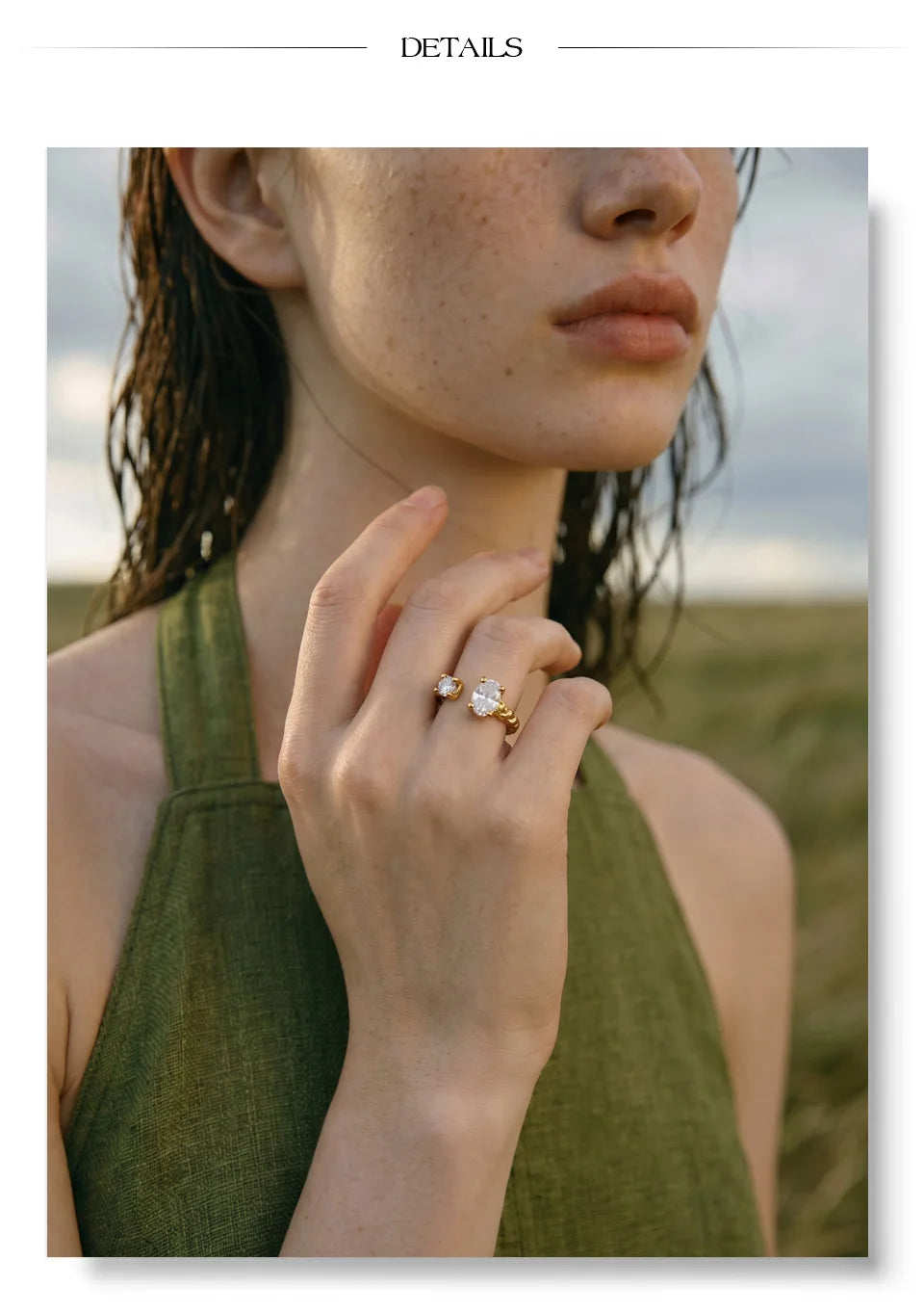 Cubic zirconia geometric ring in 18K gold-plated stainless steel with cubic zirconia.
