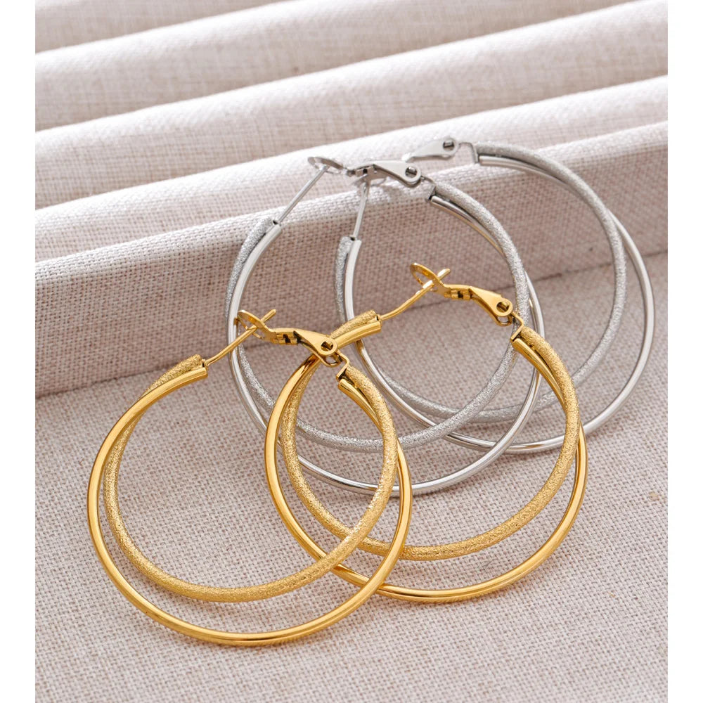 Geometric earrings in gold-plated stainless steel.