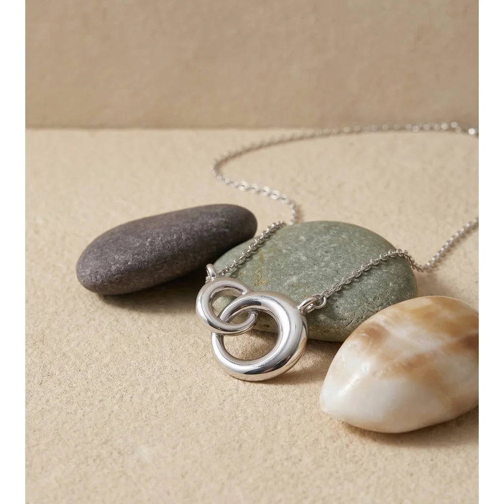 Coin geometric necklace in gold-plated stainless steel.