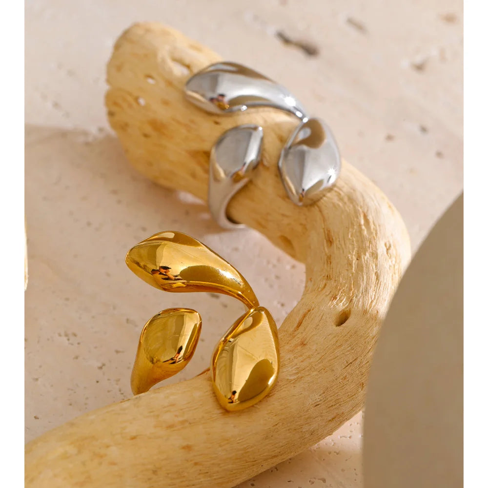 Geometric ring in gold-plated stainless steel.