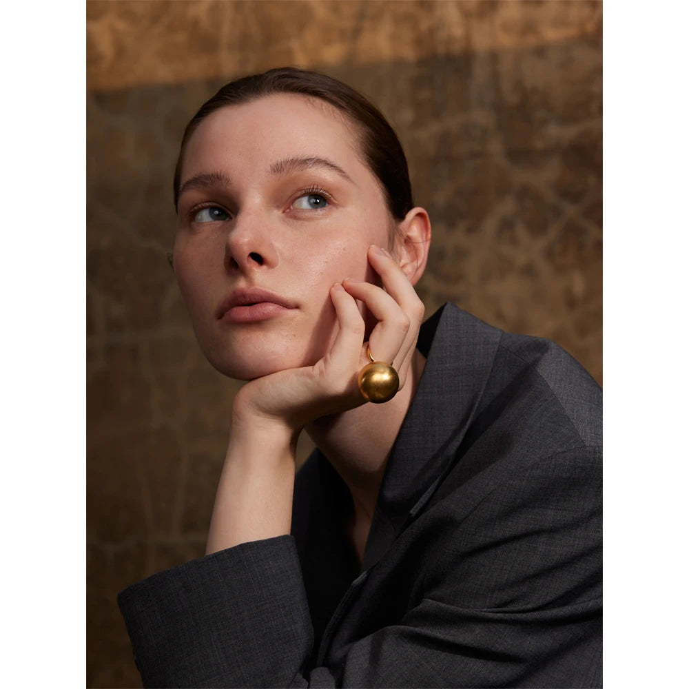 Geometric ring in 18K gold-plated stainless steel.