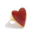 Red natural stone heart ring in 18K gold-plated stainless steel with natural stone.