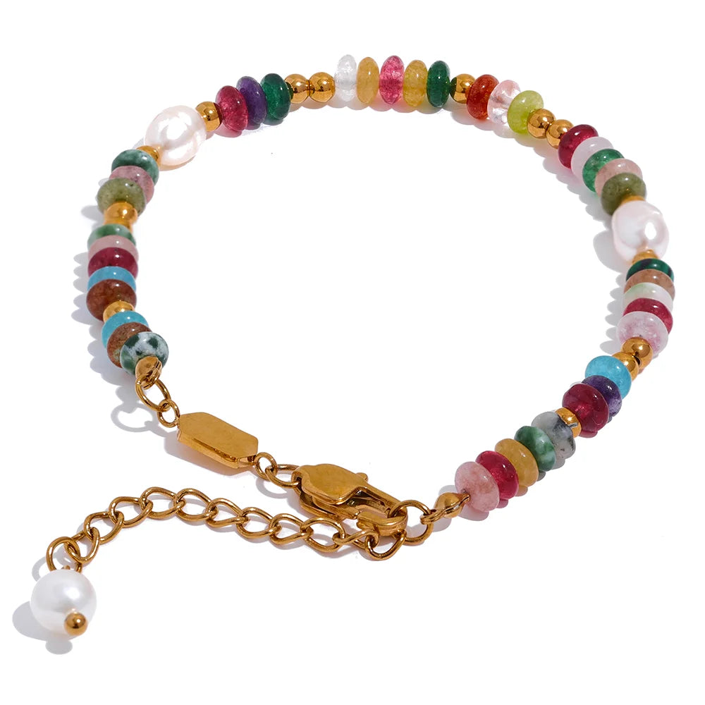 Gold-plated bracelet with pearl and natural stones.