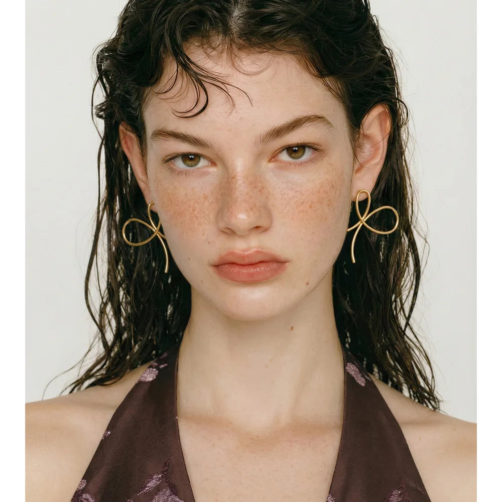 Bow Geometric Earrings — Gold-Plated Stainless Steel · PS1230