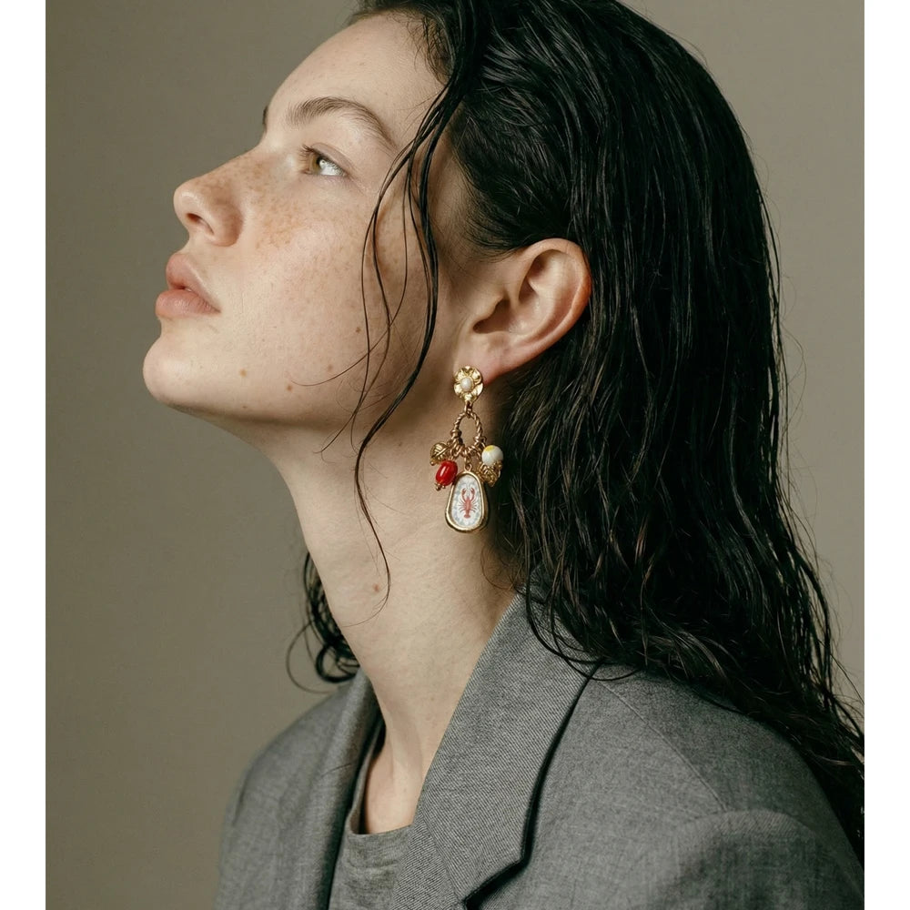 Geometric earrings in gold-plated stainless steel.