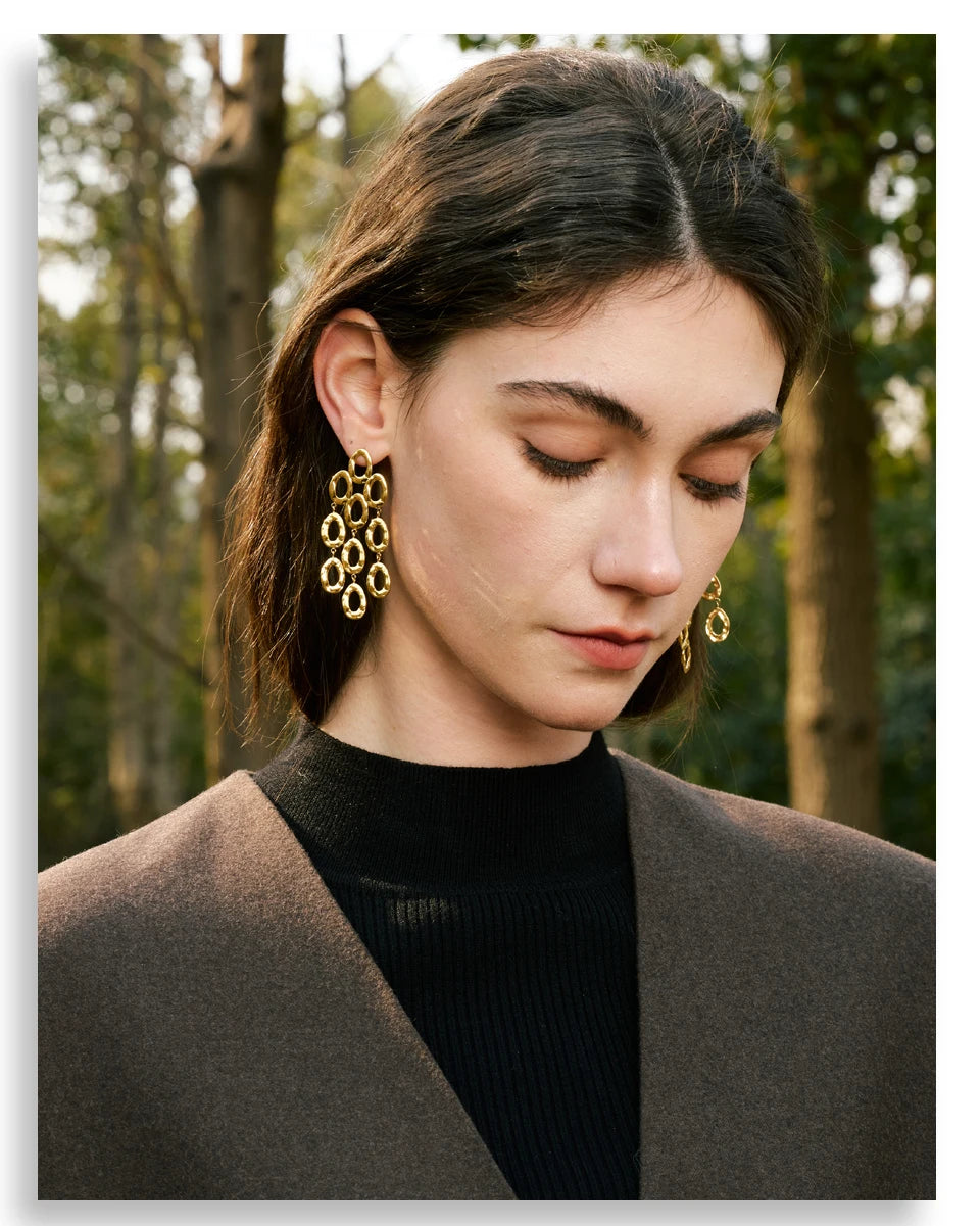 Geometric earrings in gold-plated stainless steel.