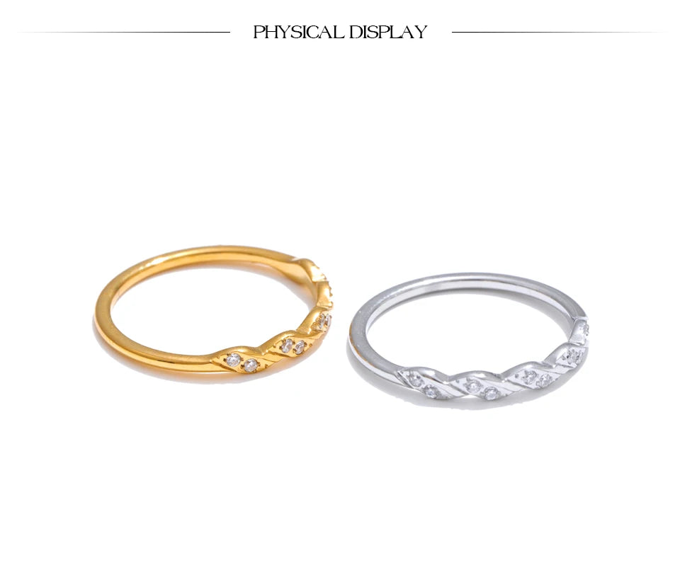 Cubic zirconia geometric ring in gold-plated stainless steel with cubic zirconia.