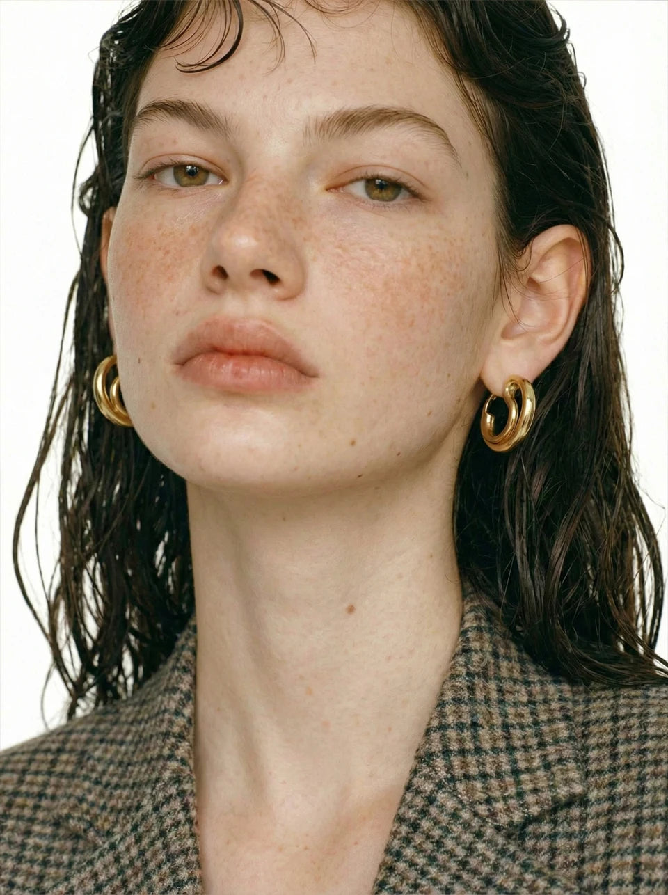 Geometric earrings in gold-plated stainless steel.